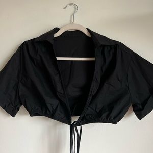 Black crop top that ties around waist
